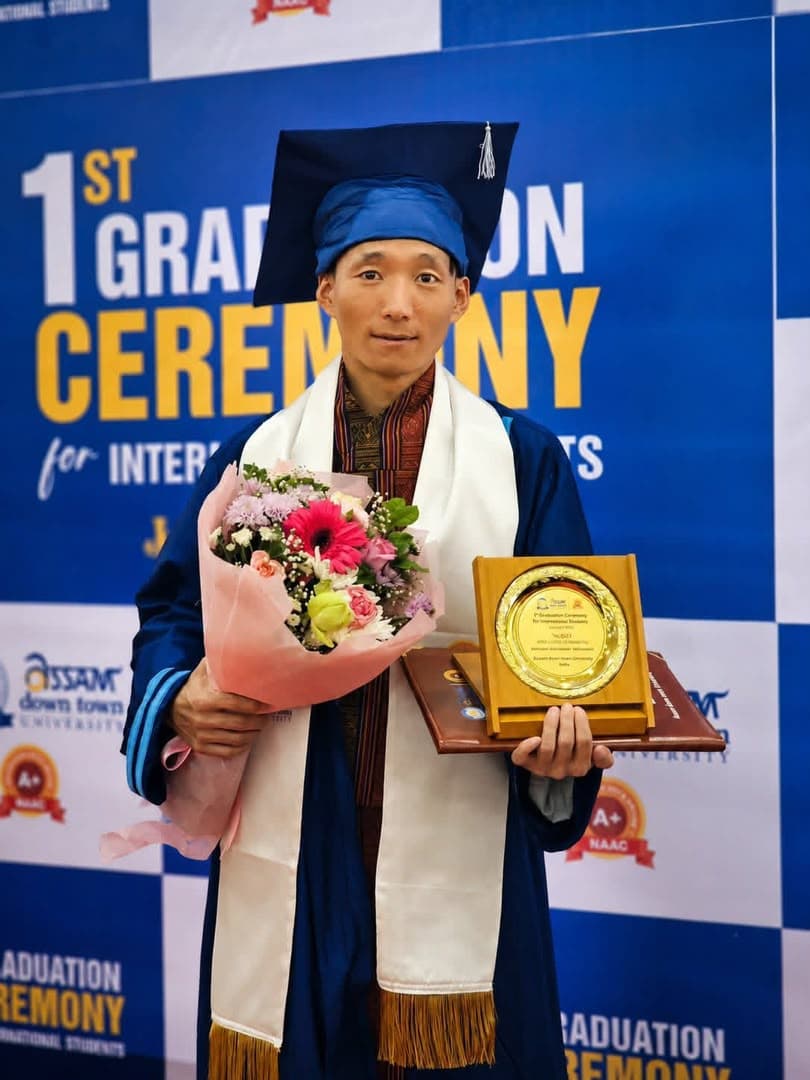Graduation Award and Flowers
